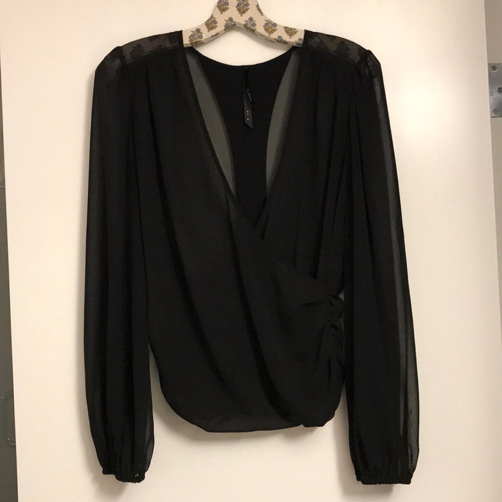 Black blouse.